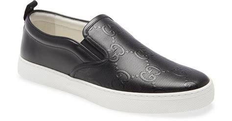 gucci embossed slip on shoes.